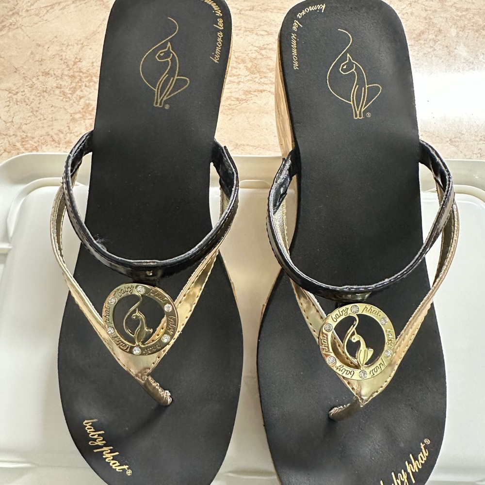 Baby Phat wedges size 7-1/2, worn 1 time, in great condition, black and gold